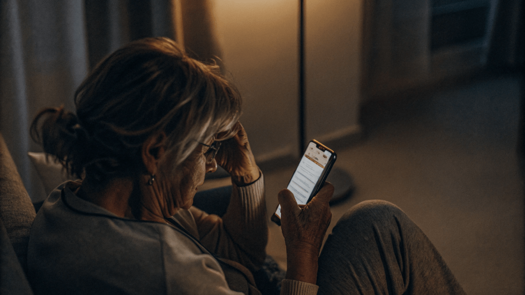 Is this the real life, is it just fantasy? 1 a women overwhelmed by what she is seeing on her phone