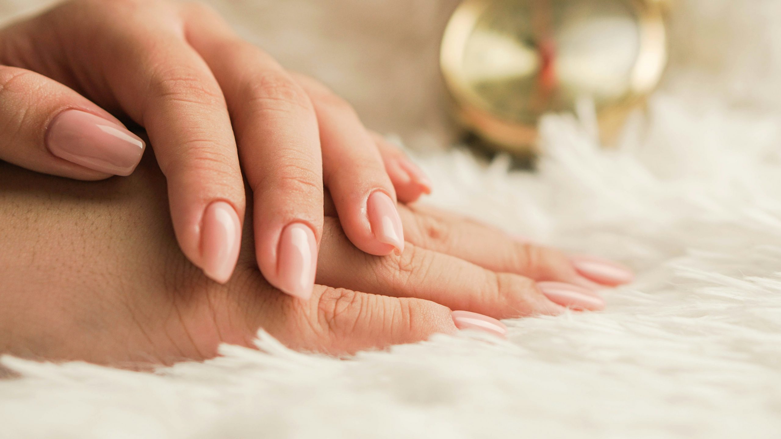 a close up of some well manicured hands