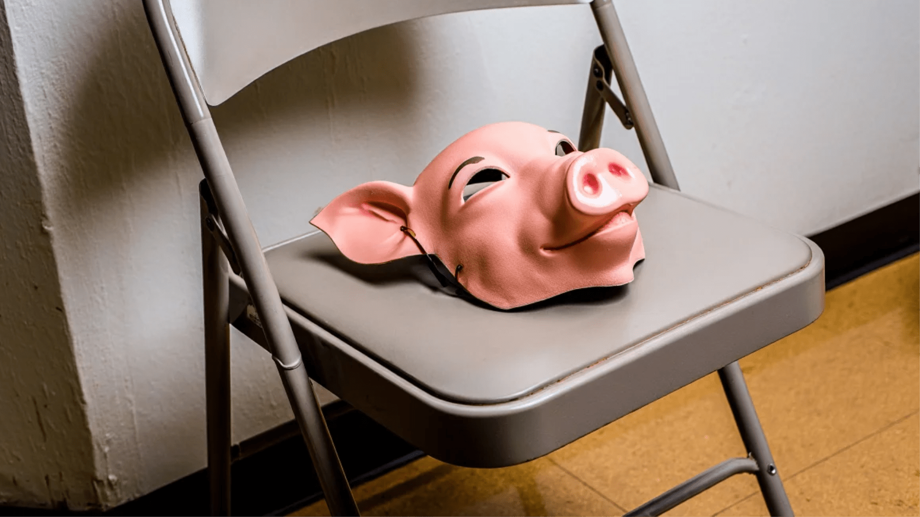 A discarded pig mask in a waiting room showing that it is possible to overcome imposter syndrome in actors